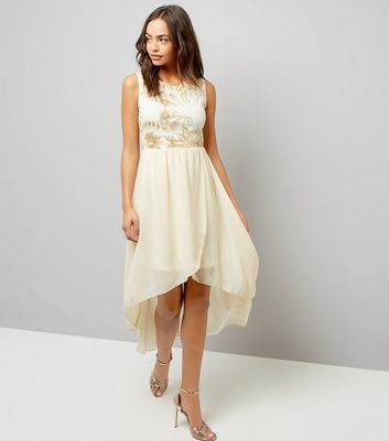 white dip hem dress