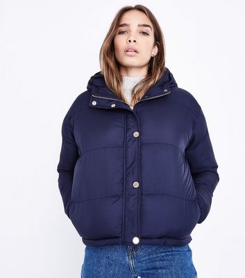 navy blue cropped puffer jacket