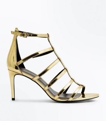 gold gladiator heels