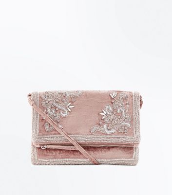 pink velvet clutch bag