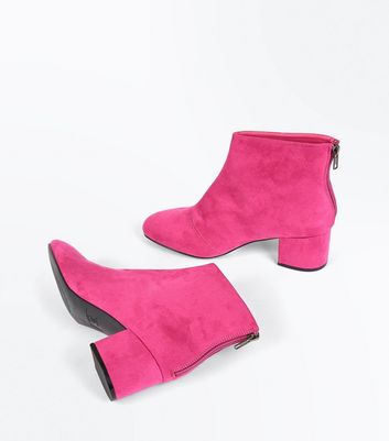 bright pink ankle boots