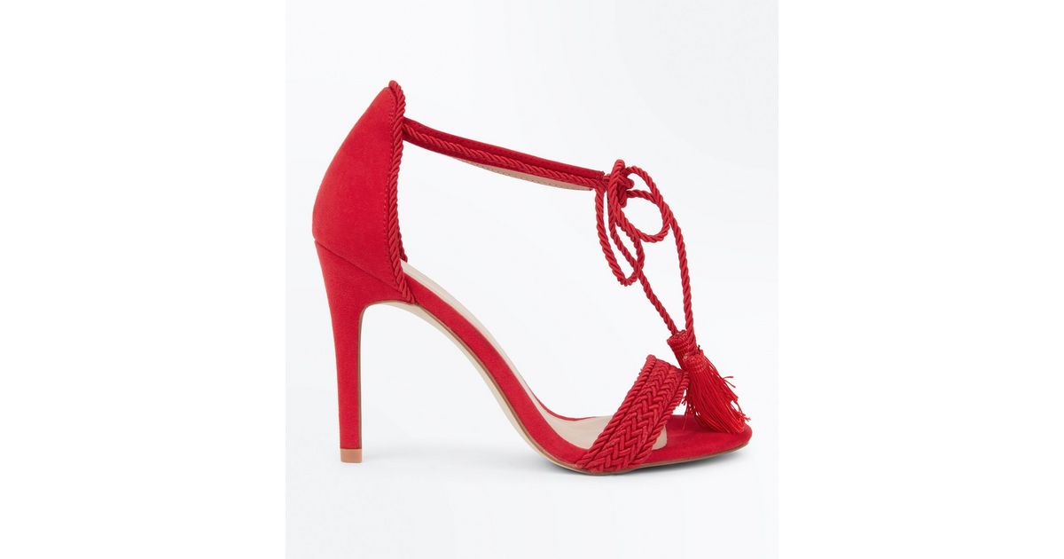 red tassel heels
