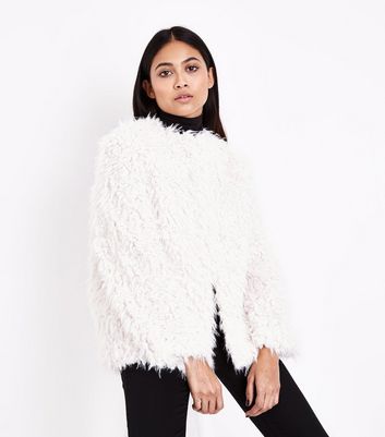 cream sheepskin coat