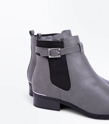 grey buckle ankle boots