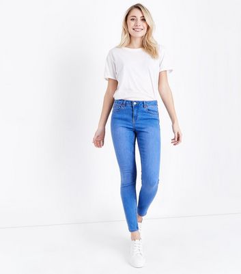 bright blue skinny jeans