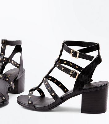 studded black block heels