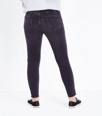 black skinny jeans frayed hem