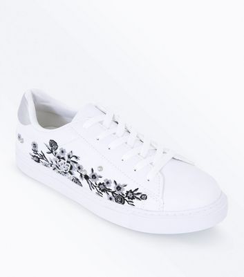 white sneakers with floral embroidery