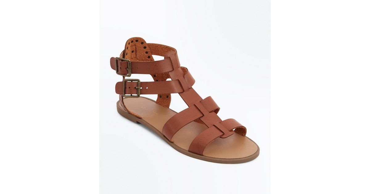 tan studded gladiator sandals