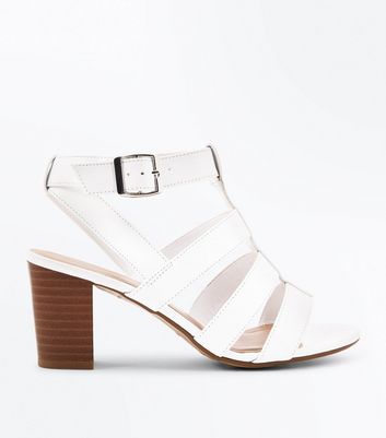 girls white heeled shoes