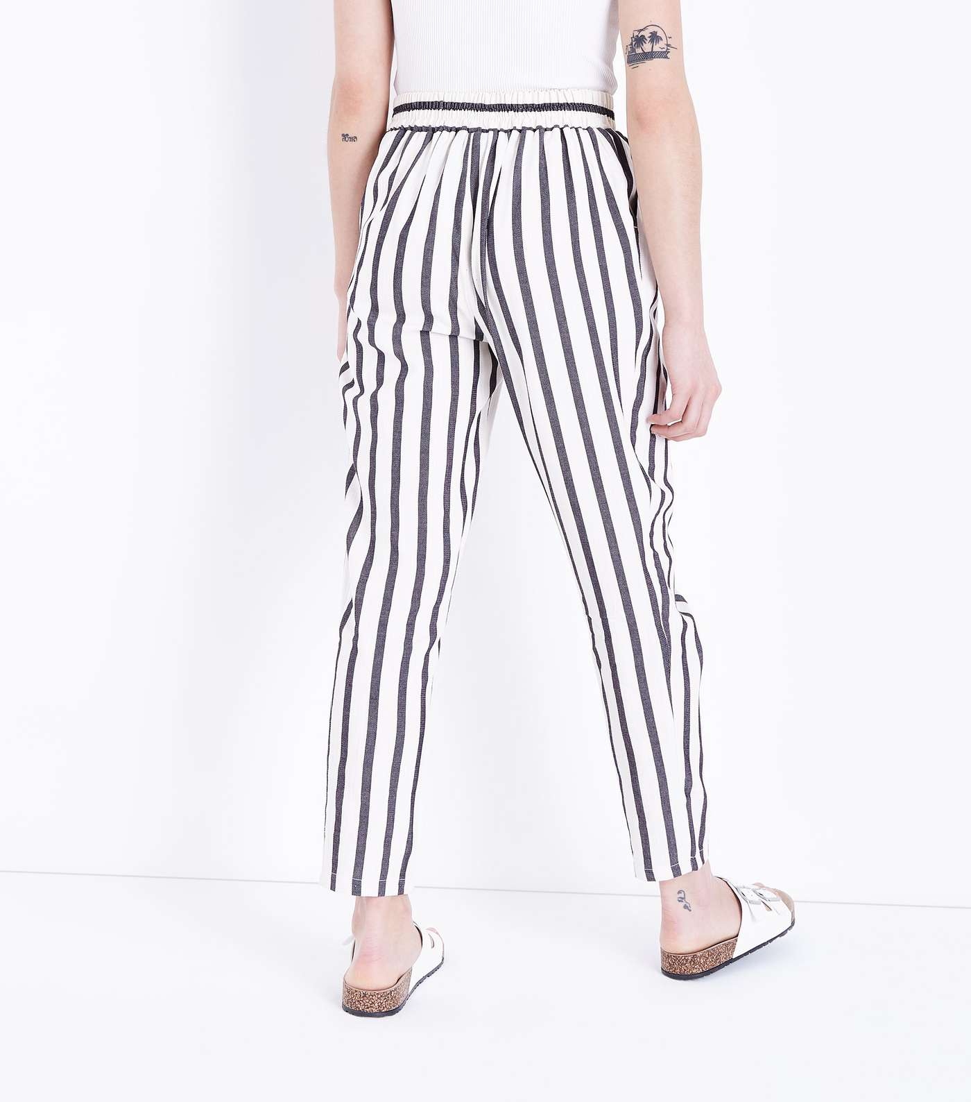 Off White Stripe Woven Tapered Trousers Image 3
