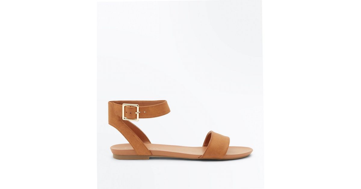 tan ankle strap