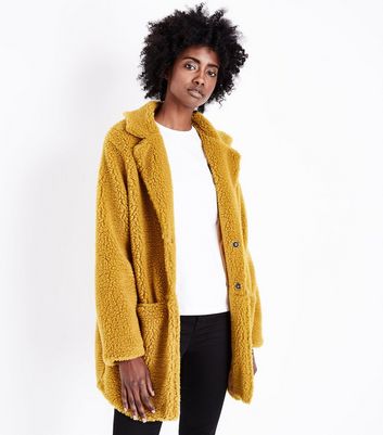 mustard teddy coat