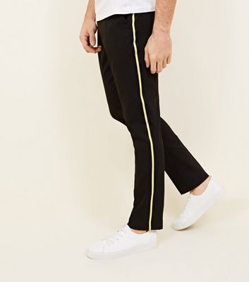 black pants with white stripe down side mens