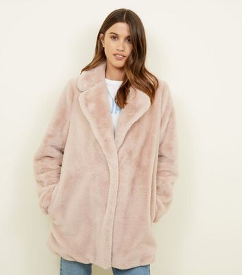 manteau fausse fourrure rose pale