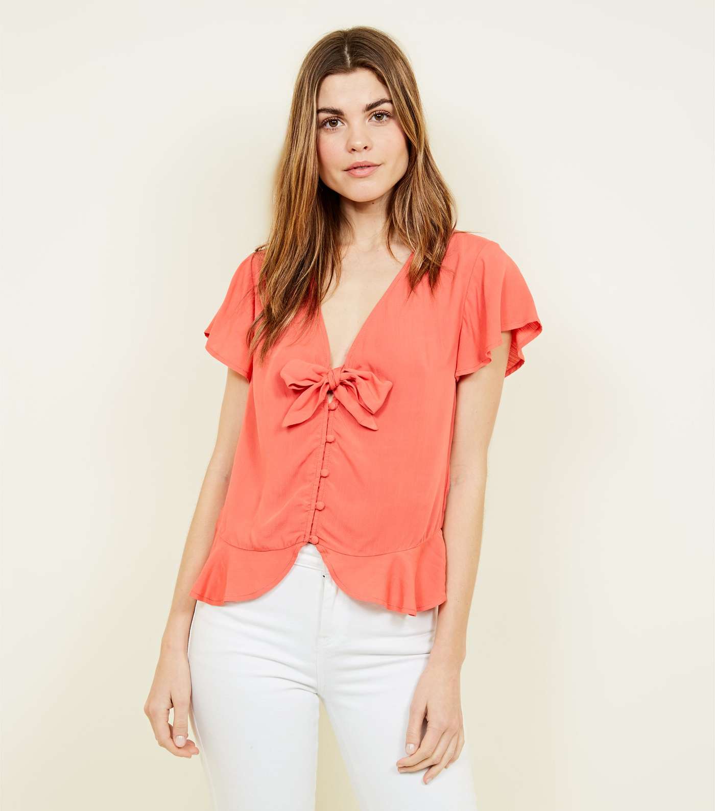 Coral Bow Front Peplum Blouse