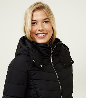 tall black faux fur hooded trim puffer jacket