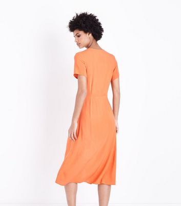 orange button front dress