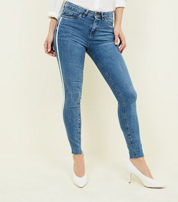 jeans with green side stripe