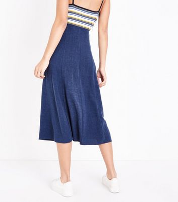 navy button front midi skirt