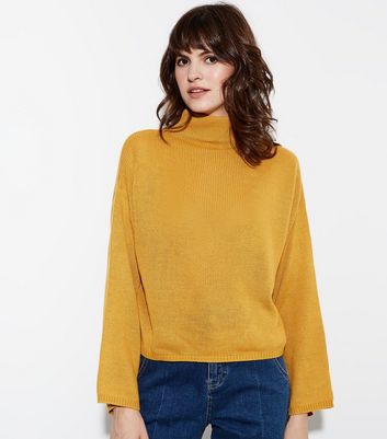 mustard turtle neck jumper