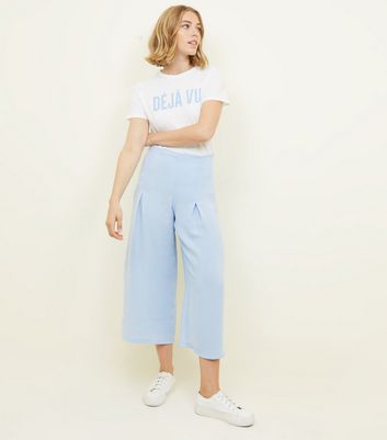 pale blue cropped trousers