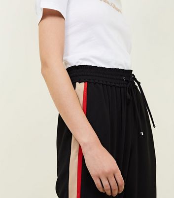 New look store side stripe trousers