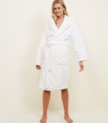 white fluffy dressing gown