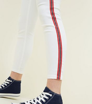 white jeans with black stripe