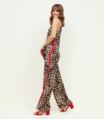 leopard print trousers with red stripe