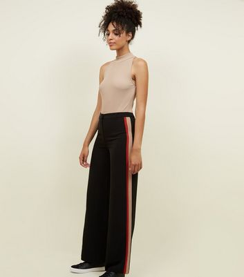 black wide leg trousers with side stripe