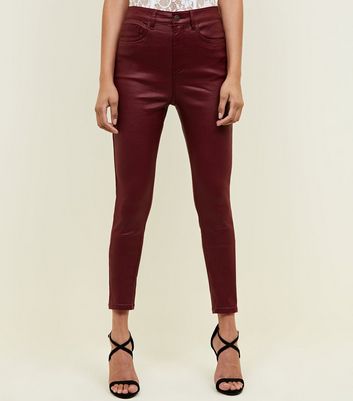 burgundy coated skinny jeans
