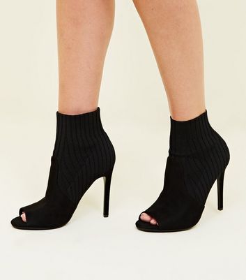 black stiletto sock boots