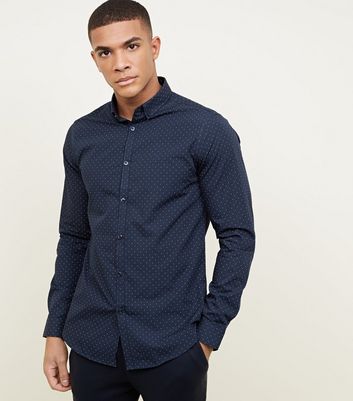 navy shirt and jeans