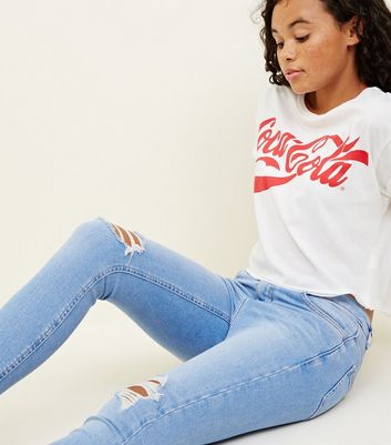 ripped bleach wash skinny jeans