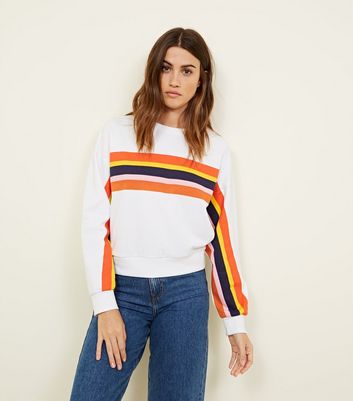 white sweatshirt with rainbow stripe