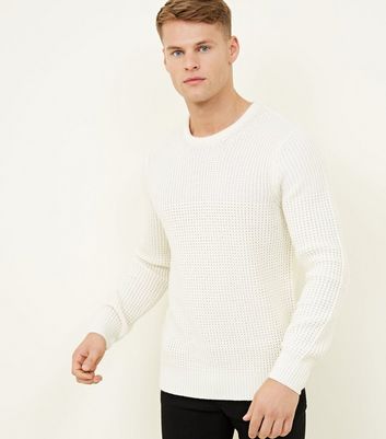 white knitted jumper