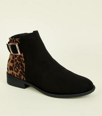 black and leopard boots