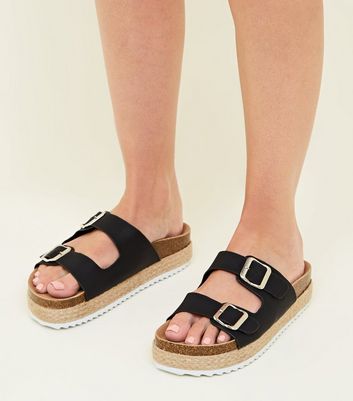 black buckle flatforms