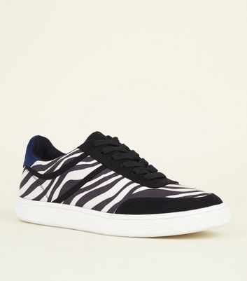 white heeled trainers