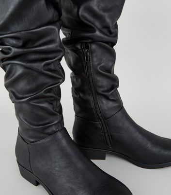 black leather slouch boots flat