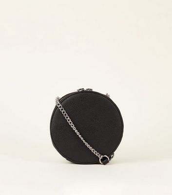 black round crossbody bag