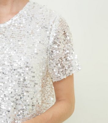 white sequin shirt