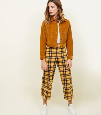 mustard cropped trousers