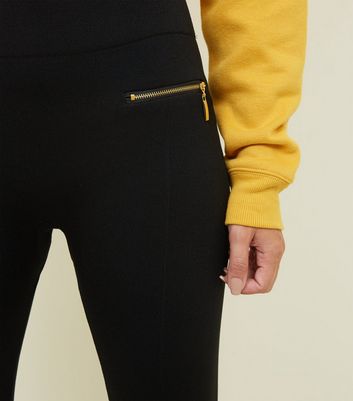 Black leggings 2025 with gold zipper