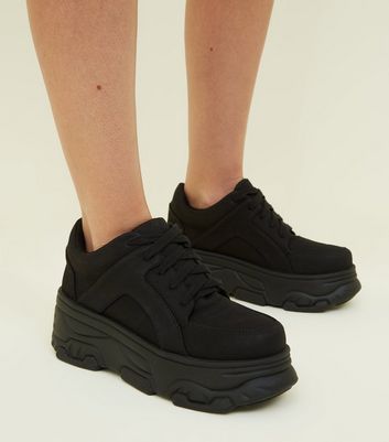 black chunky trainer boots