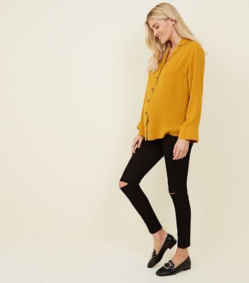 black ripped knee jeggings