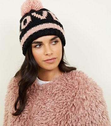 black and pink bobble hat