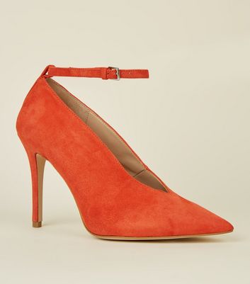 orange suede court shoes