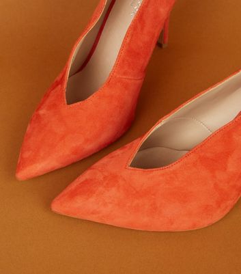 orange suede court shoes